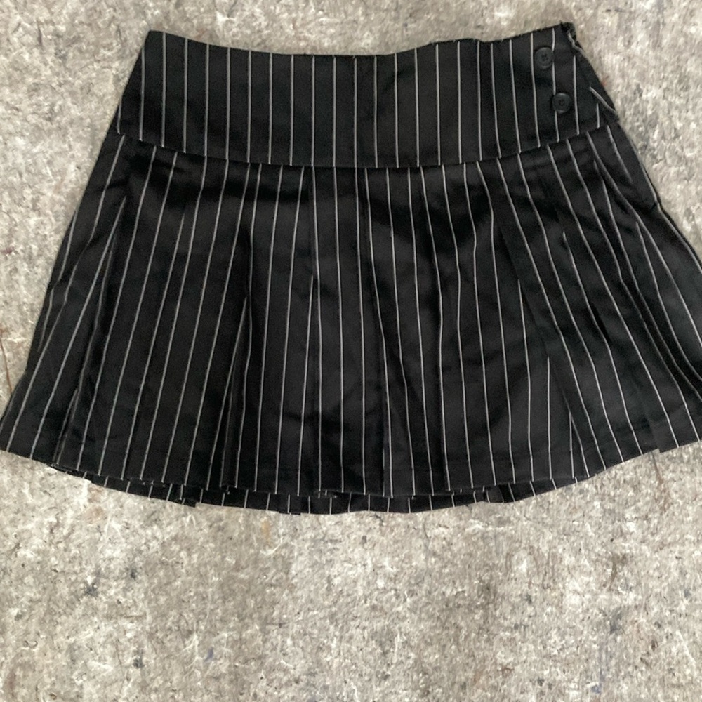 Noisy way. NWOT   Wide waist. Pleats all around bottom part of the skirt. Mini